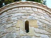 The cornice on the stone tower